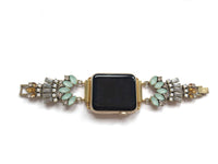 Rose Gold jeweled apple watch band with mint, clear, opal and amber glass crystals. All crystals paced in an unique 1920 inspired pattern that lead to size adjustable clasps. This beautiful band fits all series of apple watches in sizes 38mm, 40mm, 42mm, and 44mm