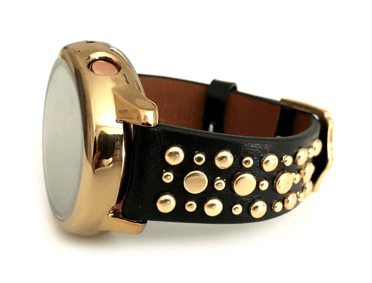 Beautiful black top grain genuine leather studded watch band. This watch band features a stainless steel buckle and is adorned with several flat circular metal studs on each side. Stud color choices include Silver, Gold, and Rose Gold. This watch band features a quick release spring bar and is a perfect fit for the Samsung watch.