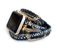 The Boho watch band features three straps on each side of your watch that wrap around the wrist creating the perfect boho style. The three straps include one faux braided leather strap, one gold chain, and one snake print faux leather strap. This boho band has a one size fits all connector fitting watch sizes 38/40/42/44. This band fits wrist sizes 6.25"-7.5" and closes with three different snaps for your custom size