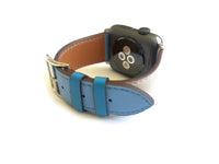 Men's and Women's blue and cream genuine leather strap. One strap blue and one strap cream. Leather straps contains blue stitching around entire outer edge.  This Apple Watch Band fits all apple series watches sized 42/44mm.  Fits wrist sizes 6.5"-8"