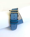 Men's and Women's BLUE  AND CREAM genuine leather strap. Leather strap contains white stitching around entire outer edge. Strap is designed to wrap around the wrist twice creating a solid cuff look. This Apple Watch Band fits all apple series watches sized 42/44mm. Fits wrist sizes 6.5"-8"