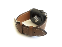 Men's and Women's brown genuine leather strap. Strap features white stitching around entire outer edge.  This Apple Watch Band fits all apple series watches sized 42/44mm.  Fits wrist sizes 6.5"-8"