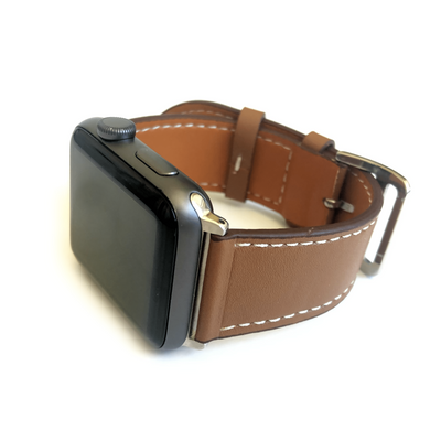 Men's and Women's brown genuine leather strap. Strap features white stitching around entire outer edge.  This Apple Watch Band fits all apple series watches sized 42/44mm.  Fits wrist sizes 6.5"-8"