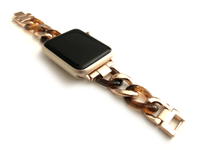 Beautiful apple watch band featuring a faux tortoise resin mixed with chain.  Fits all apple series watches in sizes 38/40  Chain colors available in silver, gold, and rose gold Fits wrist sizes: 5.5” to 7.5”