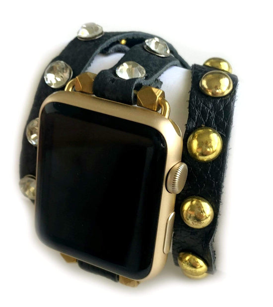 Super soft BLACK colored leather wrap Apple Watch Band with GOLD studs and crystal studs. 3 snaps to help you find your perfect size Sizing: fits a wrist size of 5.75”- 7”. Available for watch sizes 38/40/42/44mm fitting all series apple watches.