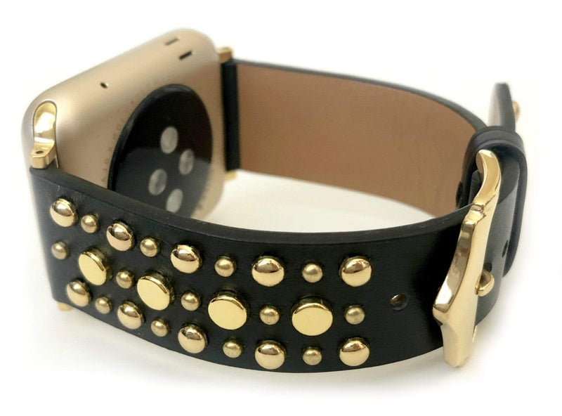 Beautiful BLACK top grain genuine LEATHER, STUDDED Apple Watch Band. This watch band features a stainless steel buckle and is adorned with several flat circular studs. Stud color choices include Silver, Gold, and Rose Gold.  This watch band fits all series of Apple Watches. Comes in sizes 38/40 and 42/44