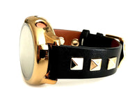 Beautiful black top grain genuine leather studded watch band. This watch band features a stainless steel buckle and is adorned with three metal studs on each side. Stud color choices include Silver, Gold, and Rose Gold. Studs are square shaped and slightly raised in the center giving them a pyramid shape. This watch band features a quick release spring bar and is a perfect fit for the Samsung watch. 