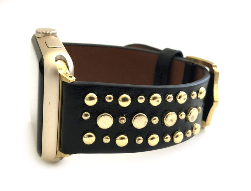 Beautiful BLACK top grain genuine LEATHER, STUDDED Apple Watch Band. This watch band features a stainless steel buckle and is adorned with several flat circular studs. Stud color choices include Silver, Gold, and Rose Gold.  This watch band fits all series of Apple Watches. Comes in sizes 38/40 and 42/44