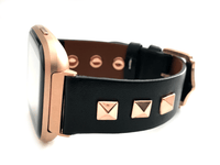 Beautiful black top grain genuine leather watch band. This watch band features a stainless steel buckle and is adorned with three metal studs on each side. Stud color choices include Silver, Gold, and Rose Gold. Studs are square shaped and slightly raised in the center giving them a pyramid shape. This watch band features a quick release spring bar and is a perfect fit for the Fitbit Versa watch.