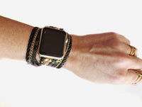 The Boho watch band features three straps on each side of your watch that wrap around the wrist creating the perfect boho style. The three straps include one faux braided leather strap, one gold chain, and one snake print faux leather strap. This boho band has a one size fits all connector fitting watch sizes 38/40/42/44. This band fits wrist sizes 6.25"-7.5" and closes with three different snaps for your custom size