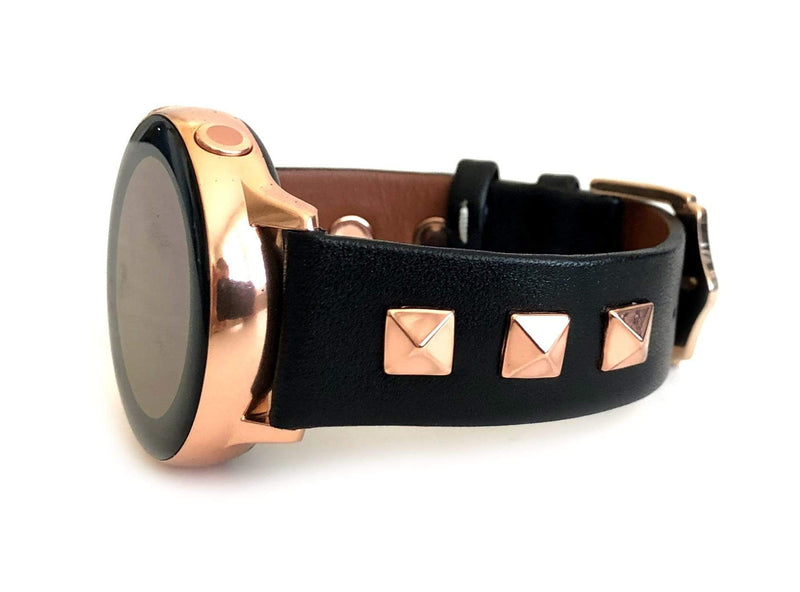 Beautiful black top grain genuine leather studded watch band. This watch band features a stainless steel buckle and is adorned with three metal studs on each side. Stud color choices include Silver, Gold, and Rose Gold. Studs are square shaped and slightly raised in the center giving them a pyramid shape. This watch band features a quick release spring bar and is a perfect fit for the Samsung Watch.