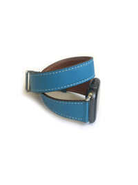 Men's and Women's BLUE  AND CREAM genuine leather strap. Leather strap contains white stitching around entire outer edge. Strap is designed to wrap around the wrist twice creating a solid cuff look. This Apple Watch Band fits all apple series watches sized 42/44mm. Fits wrist sizes 6.5"-8"