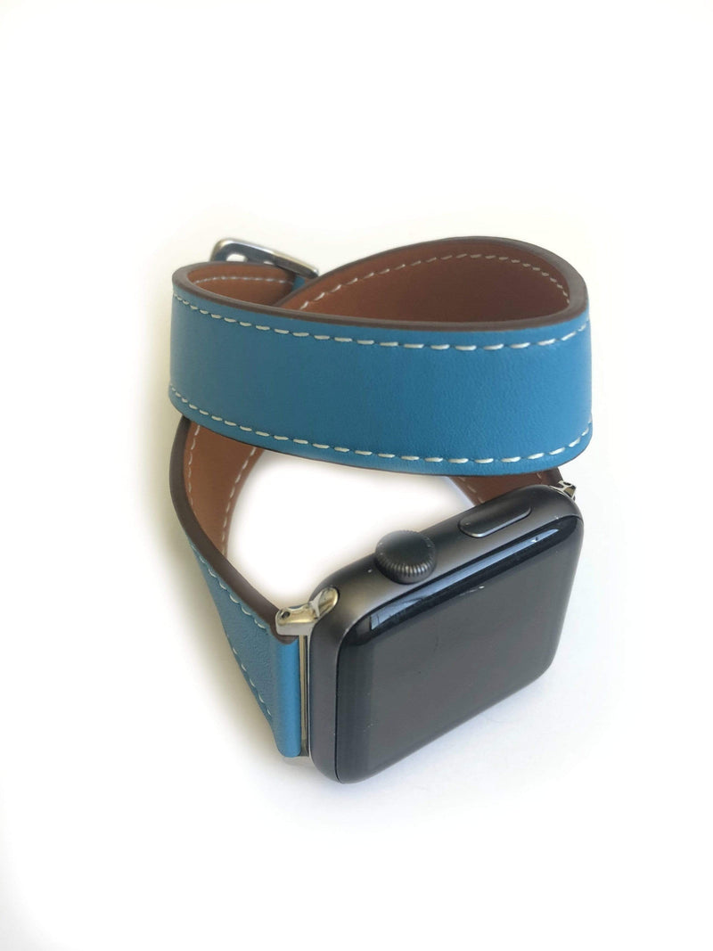 Men's and Women's BLUE  AND CREAM genuine leather strap. Leather strap contains white stitching around entire outer edge. Strap is designed to wrap around the wrist twice creating a solid cuff look. This Apple Watch Band fits all apple series watches sized 42/44mm. Fits wrist sizes 6.5"-8"