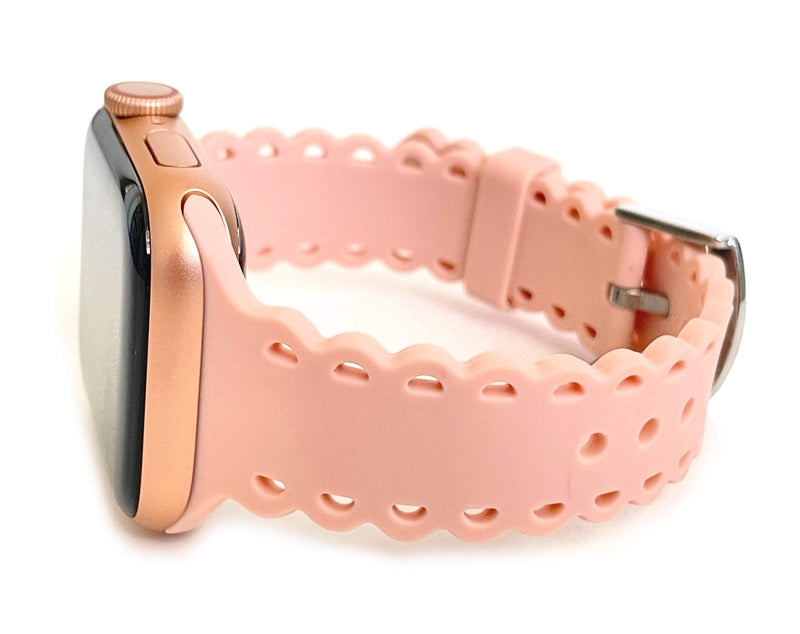 Scalloped silicone Apple Watch bands. These fit all series of Apple Watch band and fit in both sizes of Apple Watch. Silicone Stainless steel buckle closure fits wrist size 5.5"-6.5" Available in 38/40mm and 42/44mm Fits apple watch 1-6 and SE Please measure your wrist size before purchasing.  Comes in four colors: pink, black, white leopard, and feather tie dye