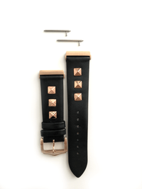 Beautiful black top grain genuine leather studded watch band. This watch band features a stainless steel buckle and is adorned with three metal studs on each side. Stud color choices include Silver, Gold, and Rose Gold. Studs are square shaped and slightly raised in the center giving them a pyramid shape. This watch band features a quick release spring bar and is a perfect fit for the Fitbit Versa watch.