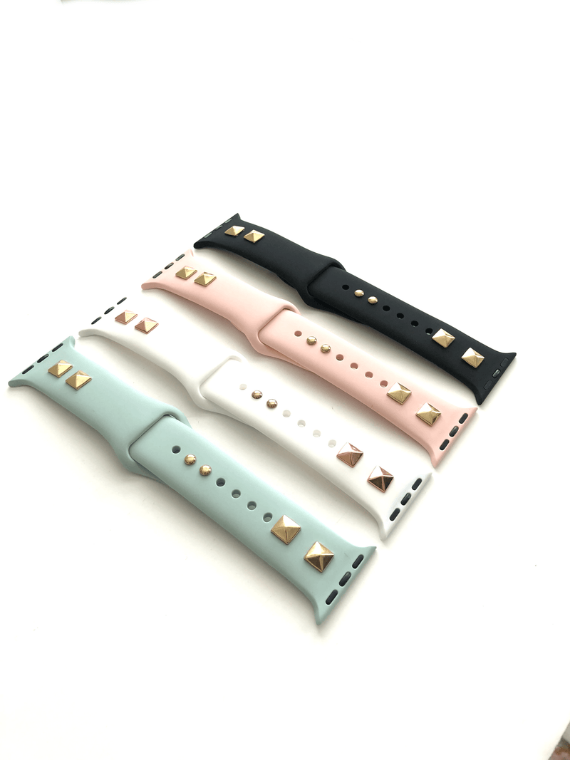 Studded silicone Apple Watch bands. These fit all series of Apple Watch band and fit in both sizes of Apple Watch.  Sizing: S/M : fits 4” up to 7” M/L: fits 6" up to 8"  Colors include: black w/ gold, black w/ silver, black w/ rose gold, pink w/ gold,  white w/ rose gold, mint w/ gold Please measure your wrist size before purchasing.