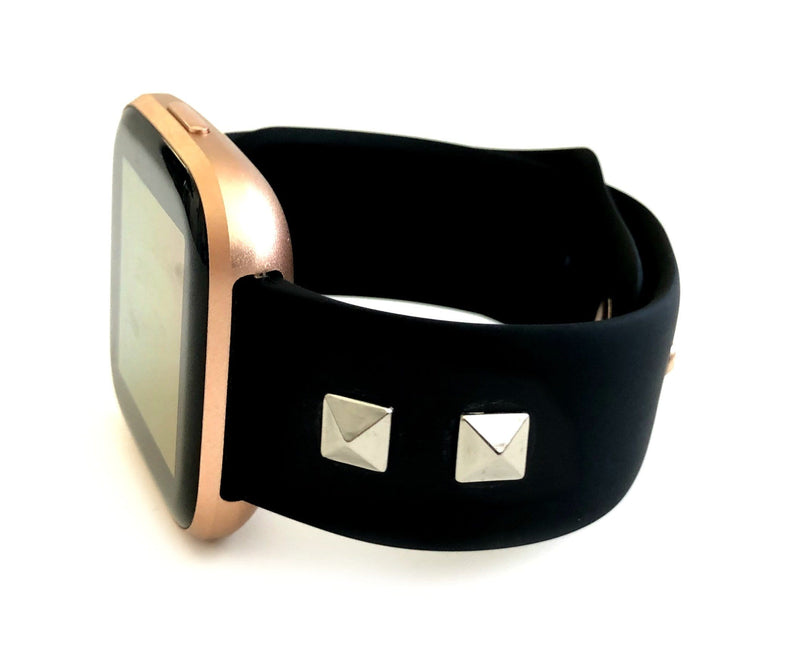 These beautiful studded leather quick release watch bands are a perfect fit for the Fitbit Versa watch. This black watch band is crafted from hand selected top grain leather and 316L stainless steel, making it fashionably perfect for work or a fun night out! Swap in Seconds: Integrated quick release spring bars Color: Black with your choice of color of studs: gold, rose gold, silver Material: Genuine Leather Hardware: 316L stainless steel buckle and studs.