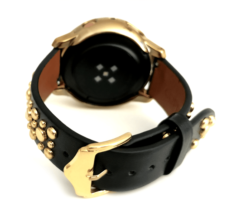 Beautiful black top grain genuine leather studded watch band. This watch band features a stainless steel buckle and is adorned with several flat circular metal studs on each side. Stud color choices include Silver, Gold, and Rose Gold. This watch band features a quick release spring bar and is a perfect fit for the Samsung watch. 