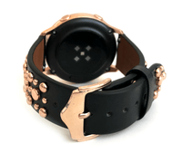 Beautiful black top grain genuine leather studded watch band. This watch band features a stainless steel buckle and is adorned with several flat circular metal studs on each side. Stud color choices include Silver, Gold, and Rose Gold. This watch band features a quick release spring bar and is a perfect fit for the Samsung watch. 