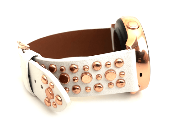 Beautiful WHITE top grain genuine LEATHER STUDDED watch band. This watch band features a stainless steel buckle and is adorned with several flat circular metal studs on each side. Stud color choices include Silver, Gold, and Rose Gold. This watch band features a quick release spring bar and is a perfect fit for the Samsung watch. 