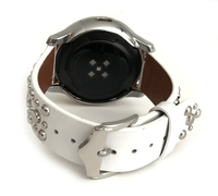 Beautiful WHITE top grain genuine LEATHER STUDDED watch band. This watch band features a stainless steel buckle and is adorned with several flat circular metal studs on each side. Stud color choices include Silver, Gold, and Rose Gold. This watch band features a quick release spring bar and is a perfect fit for the Samsung watch. 