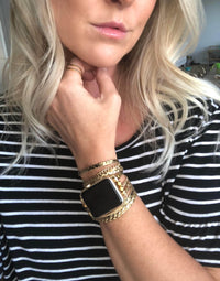 The Boho watch band features three straps on each side of your watch that wrap around the wrist creating the perfect boho style. The three straps include one faux braided leather strap, one gold chain, and one snake print faux leather strap. This boho band has a one size fits all connector fitting watch sizes 38/40/42/44. This band fits wrist sizes 6"-7.5" and closes with three different snaps for your custom size.