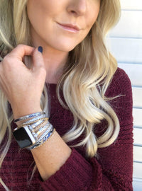 The Boho watch band features three straps on each side of your watch that wrap around the wrist creating the perfect boho style. The three straps include one faux braided leather strap, one gold chain, and one snake print faux leather strap. This boho band has a one size fits all connector fitting watch sizes 38/40/42/44. This band fits wrist sizes 6"-7.5" and closes with three different snaps for your custom size.