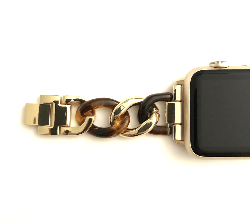 Beautiful apple watch band featuring a faux tortoise resin mixed with chain.  Fits all apple series watches in sizes 38/40  Chain colors available in silver, gold, and rose gold Fits wrist sizes: 5.5” to 7.5”