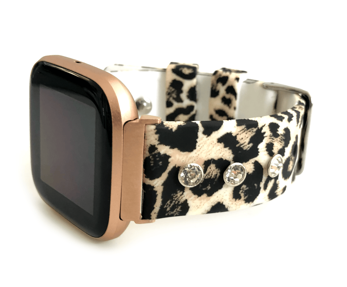 This gorgeous leopard print, silicone band for the Fitbit Versa. This band has a touch of bling that you have come to expect from a Copper Robin Watch . Three beautiful glass crystal studs adorn each side of the band. If bling is not your thing, you may also purchase the diva with out crystal studs.