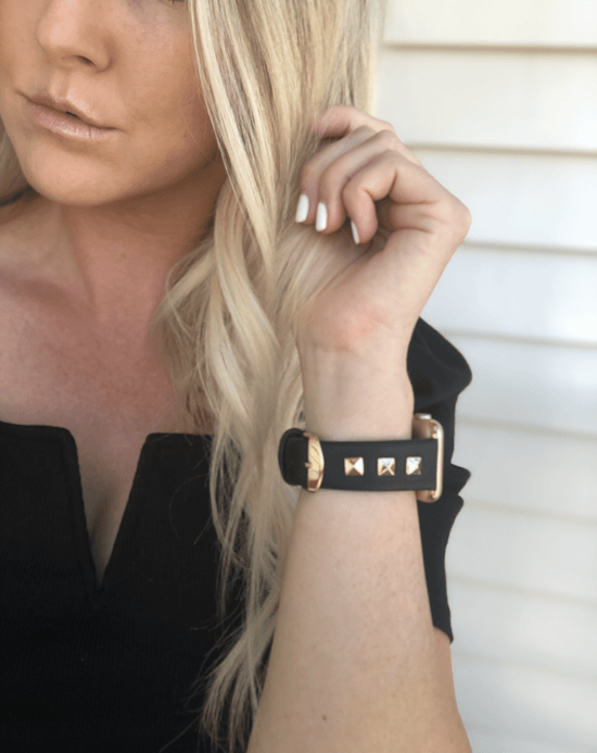 Beautiful black top grain genuine leather studded watch band. This watch band features a stainless steel buckle and is adorned with three metal studs on each side. Stud color choices include Silver, Gold, and Rose Gold. Studs are square shaped and slightly raised in the center giving them a pyramid shape.