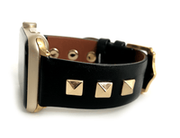 Beautiful black top grain genuine leather studded watch band. This watch band features a stainless steel buckle and is adorned with three metal studs on each side. Stud color choices include Silver, Gold, and Rose Gold. Studs are square shaped and slightly raised in the center giving them a pyramid shape.