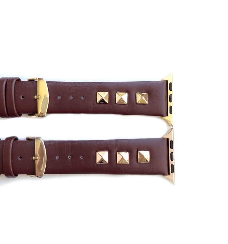 Beautiful BURGUNDY top grain genuine LEATHER, STUDDED Apple Watch Band. This watch band features a stainless steel buckle and is adorned with three metal studs on each side. Stud color choices include Silver, Gold, and Rose Gold.  This watch band fits all series of Apple Watches. Comes in sizes 38/40 and 42/44